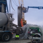 Clear AFB-Putz 2070 filling 150' pilings with grout at -20 degrees F.