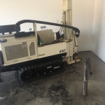 Palmer - small drill rig used in 8' headroom to insert pipes down to stable ground to densify and lift with low-mobility grout. The large void and initial lift was done with fluid cellular grout first.