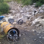 Kodiak-release cables, grout lines, and air lines were attached to the plug before lowering into the pipe.