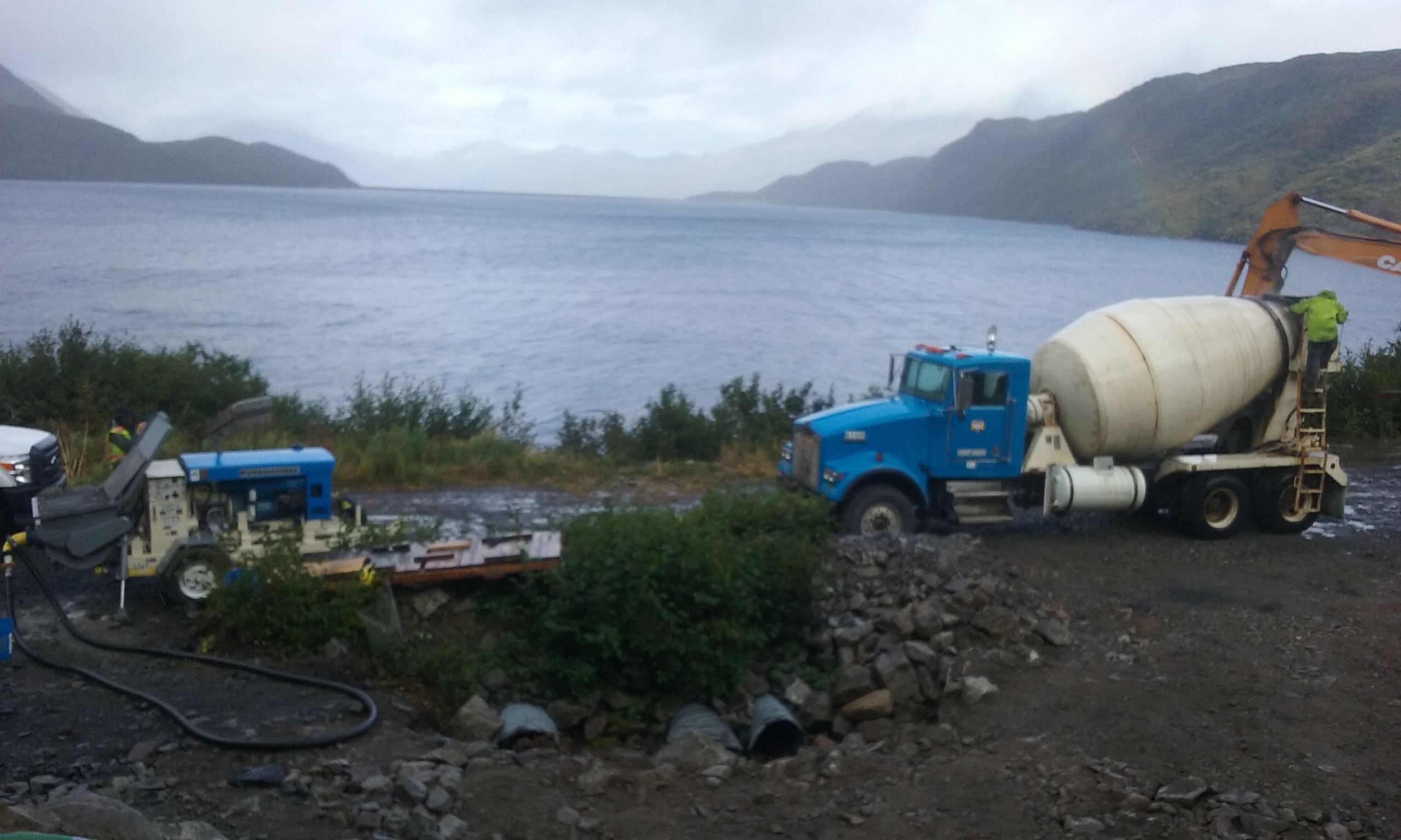 Kodiak-Terror Lk- Designed and mixed a fluid, high-strength grout on site to fill a void 40' down an air release tube for the penstock.