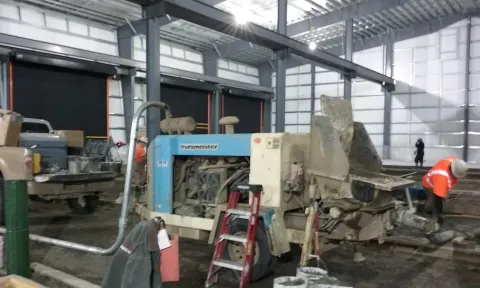 Deadhorse - Putz TK70 set up to pump inside slab of large shop in winter. It took a couple of weeks to pour well over 1000 yrds.