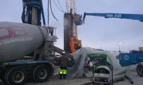 Clear AFB-Putz 2070 filling 150' pilings with grout at -20 degrees F.