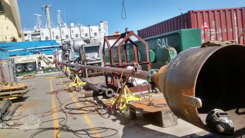 Cook Inlet-A 160' long tremie pipe was used to carry fast-setting grout to the bottom of platform.